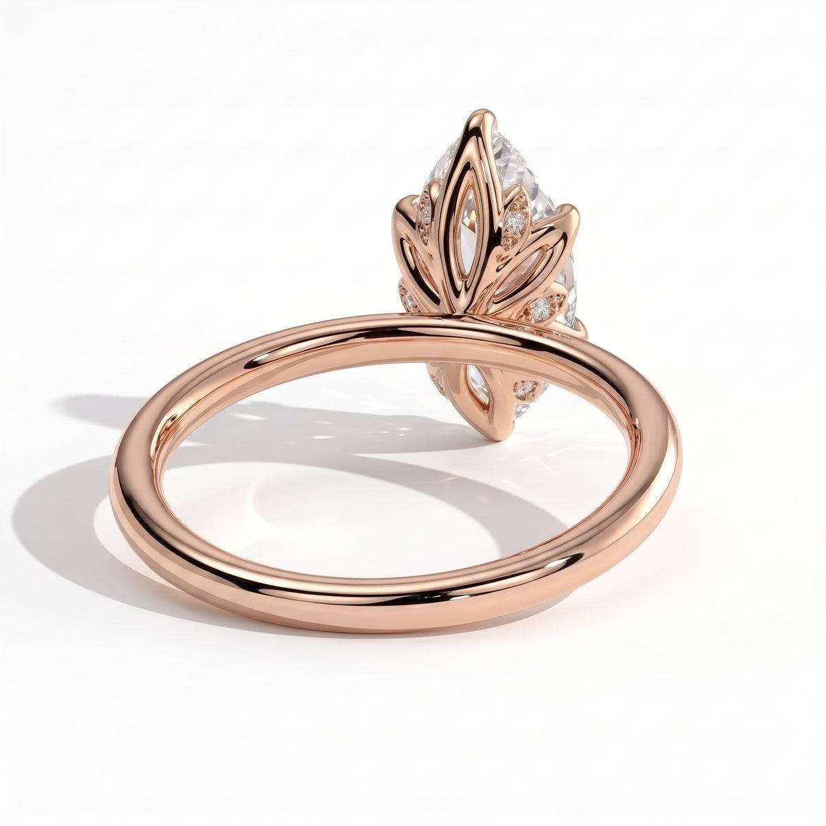 Marquise lab-grown diamond solitaire engagement ring in 14K (585) rose gold, on white background