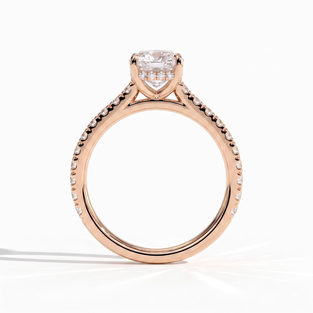 Elongated Cushion lab-grown diamond halo engagement ring in 18K (750) rose gold, side profile
