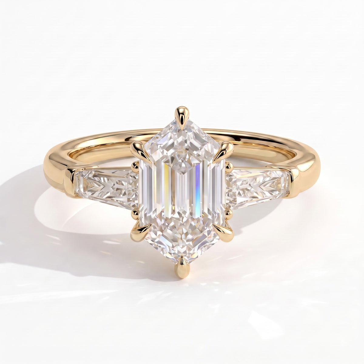 Elongated Hexagon lab-grown diamond three-stone engagement ring in 18K (750) yellow gold, front view