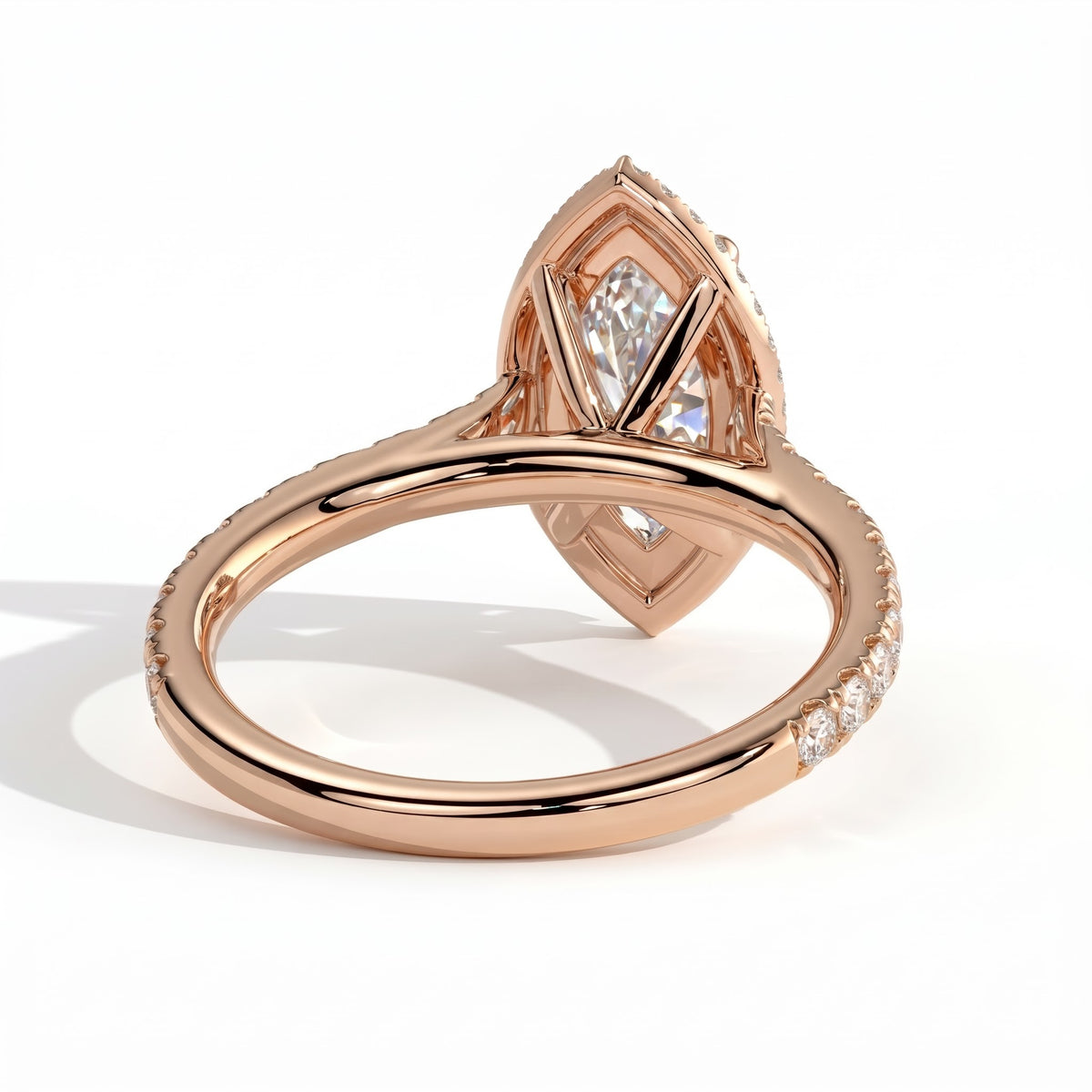 Marquise lab-grown diamond halo engagement ring in 18K (750) rose gold, on white background