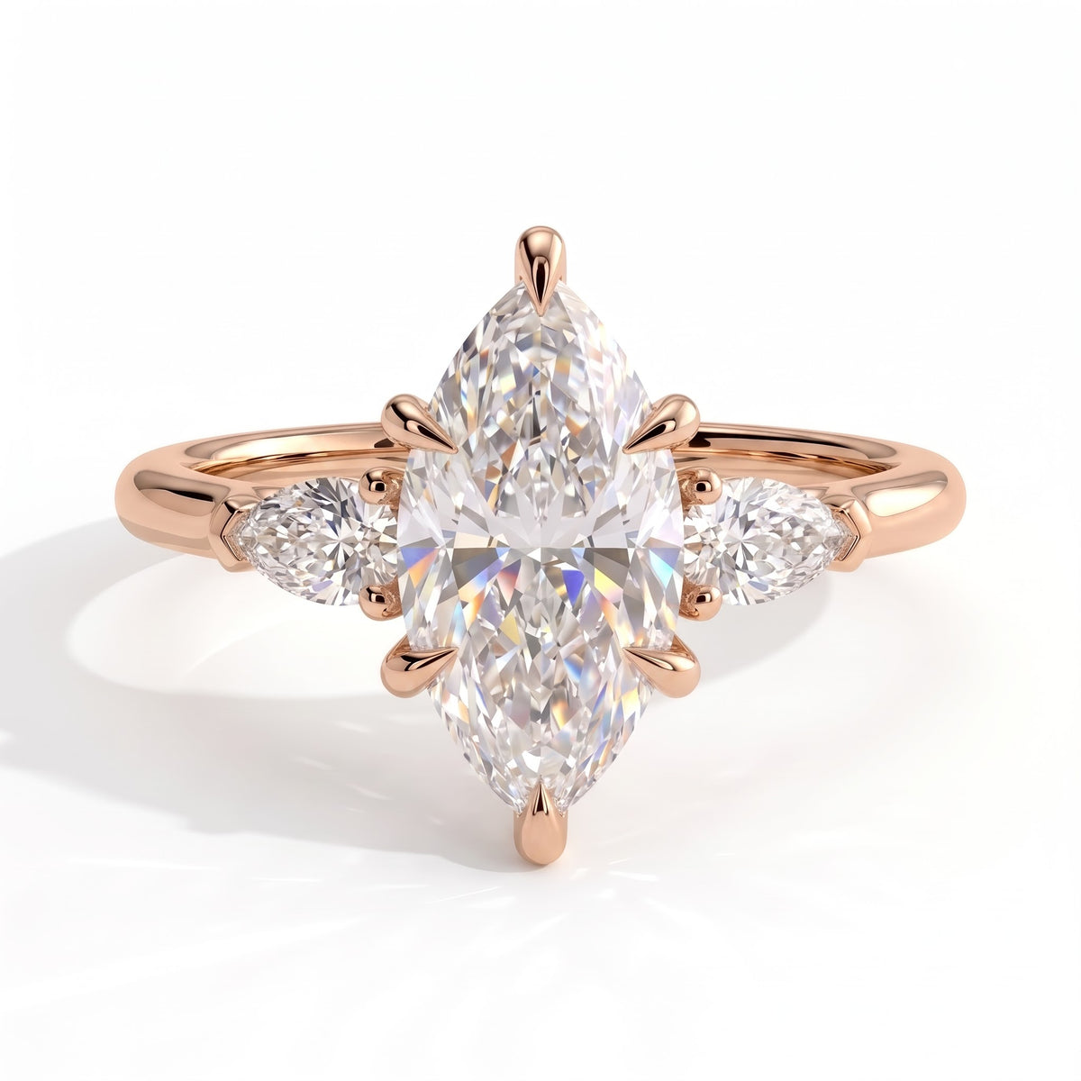 Marquise lab-grown diamond three-stone engagement ring in 18K (750) rose gold, front view