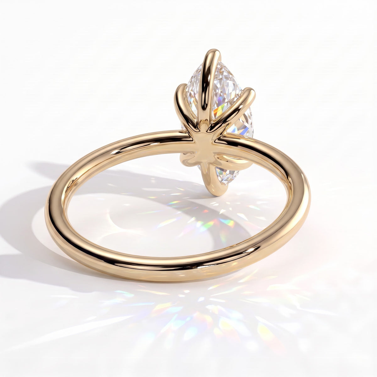 Marquise lab-grown diamond solitaire engagement ring in 14K (585) yellow gold, on white background