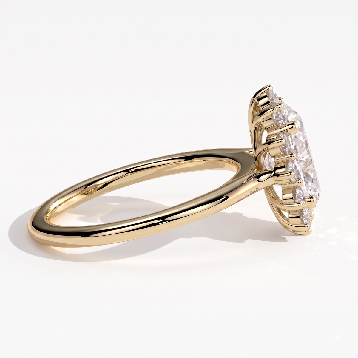 Oval lab-grown diamond halo engagement ring in 18K (750) yellow gold, detail view