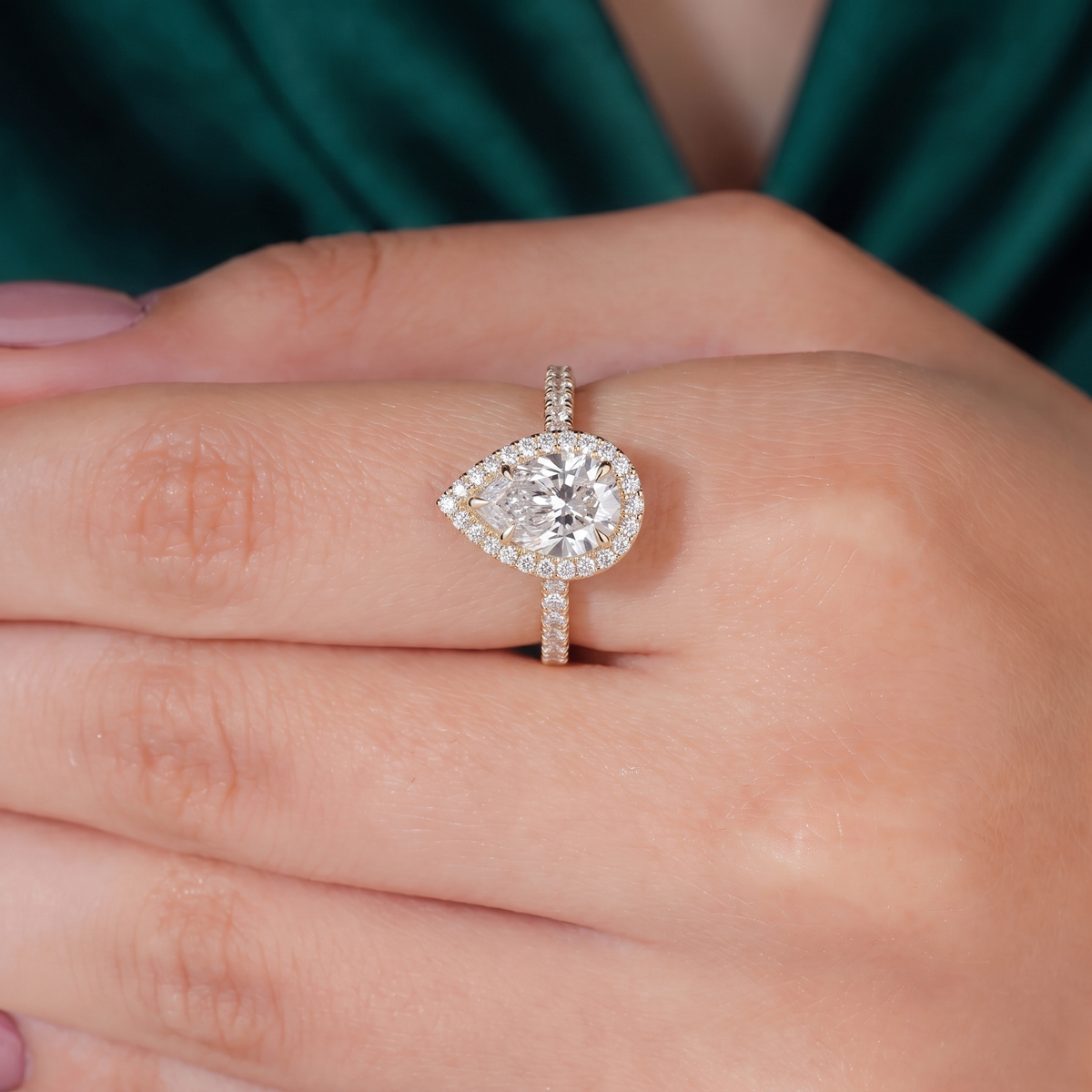Pear lab-grown diamond halo engagement ring in 14K (585) yellow gold, three-quarter view