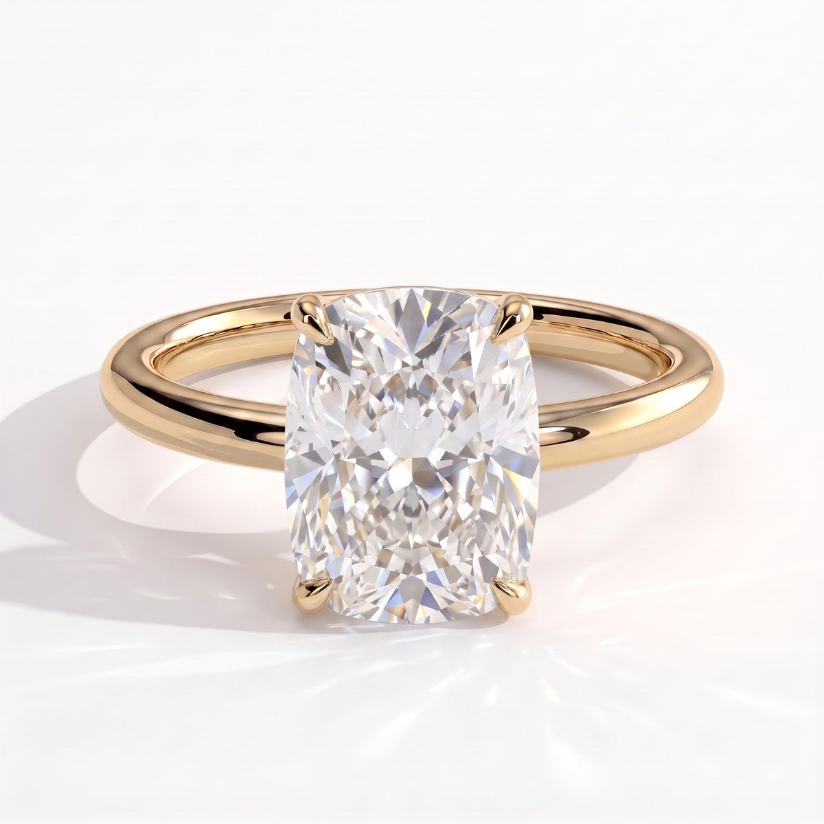 Elongated Cushion lab-grown diamond solitaire engagement ring in 18K (750) yellow gold, front view