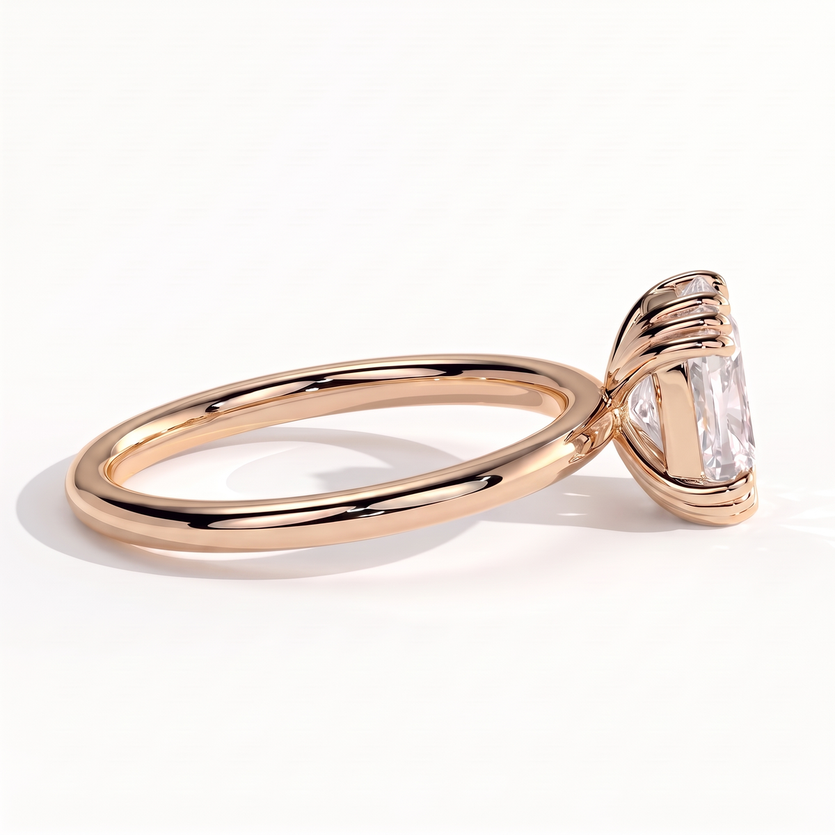 Elongated Cushion lab-grown diamond solitaire engagement ring in 14K (585) rose gold, on white background