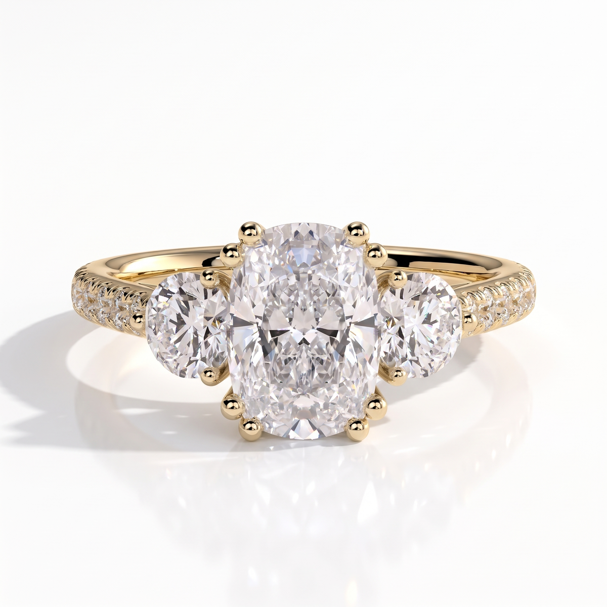 Elongated Cushion lab-grown diamond three-stone engagement ring in 14K (585) yellow gold, front view