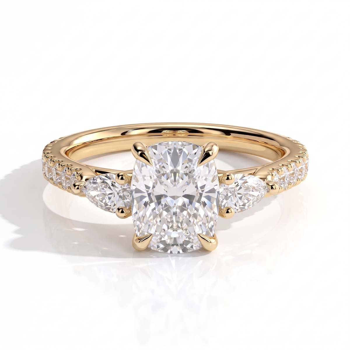 Elongated Cushion lab-grown diamond three-stone engagement ring in 18K (750) yellow gold, front view