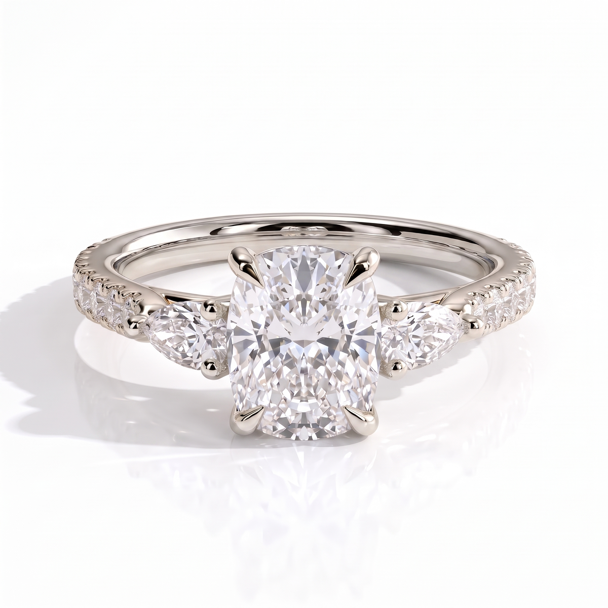 Elongated Cushion lab-grown diamond three-stone engagement ring in 950 platinum, front view
