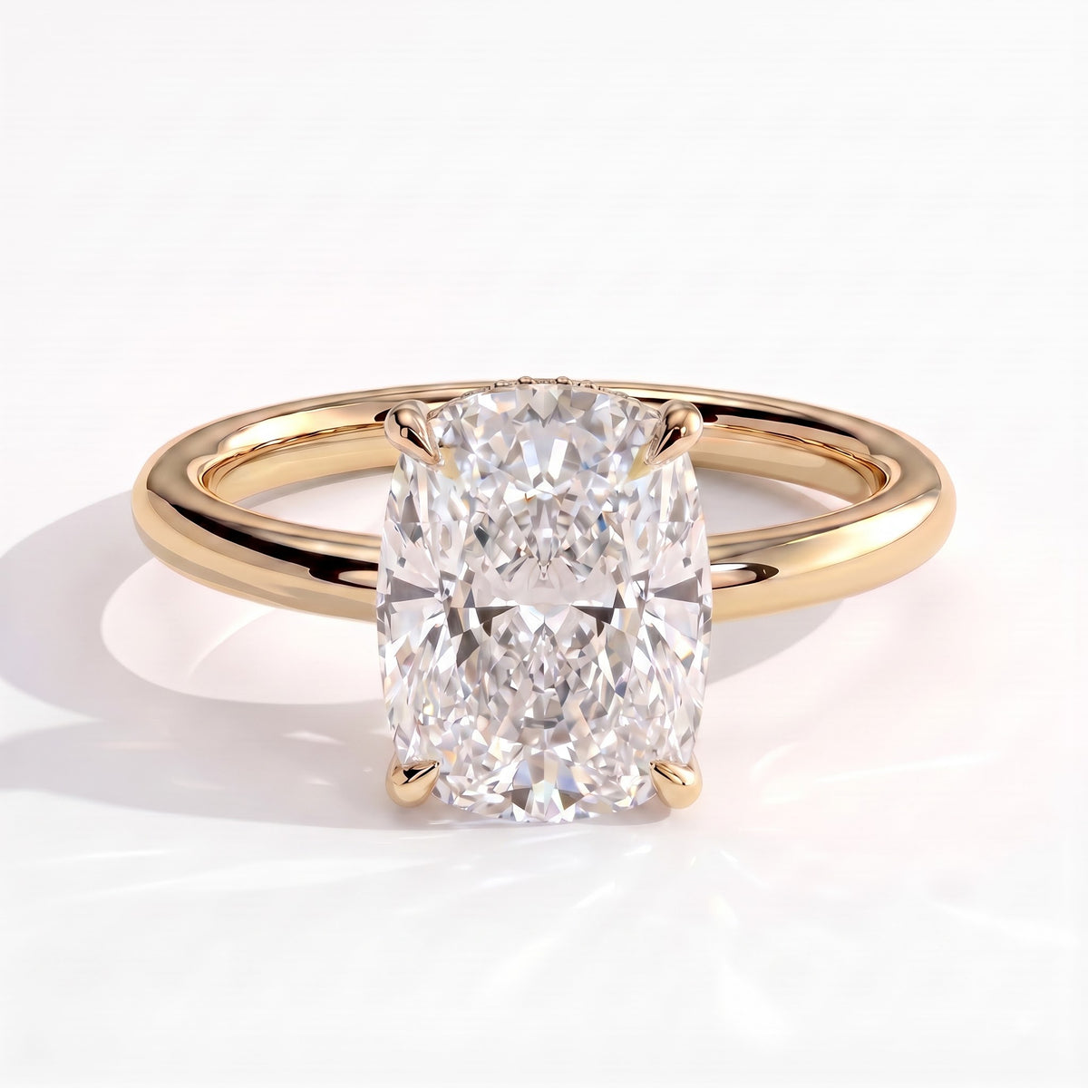 Elongated Cushion lab-grown diamond halo engagement ring in 18K (750) yellow gold, front view