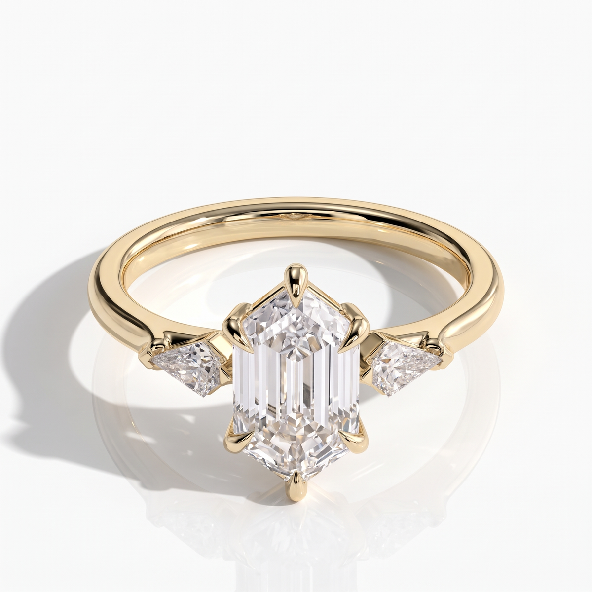Elongated Hexagon lab-grown diamond three-stone engagement ring in 18K (750) yellow gold, front view