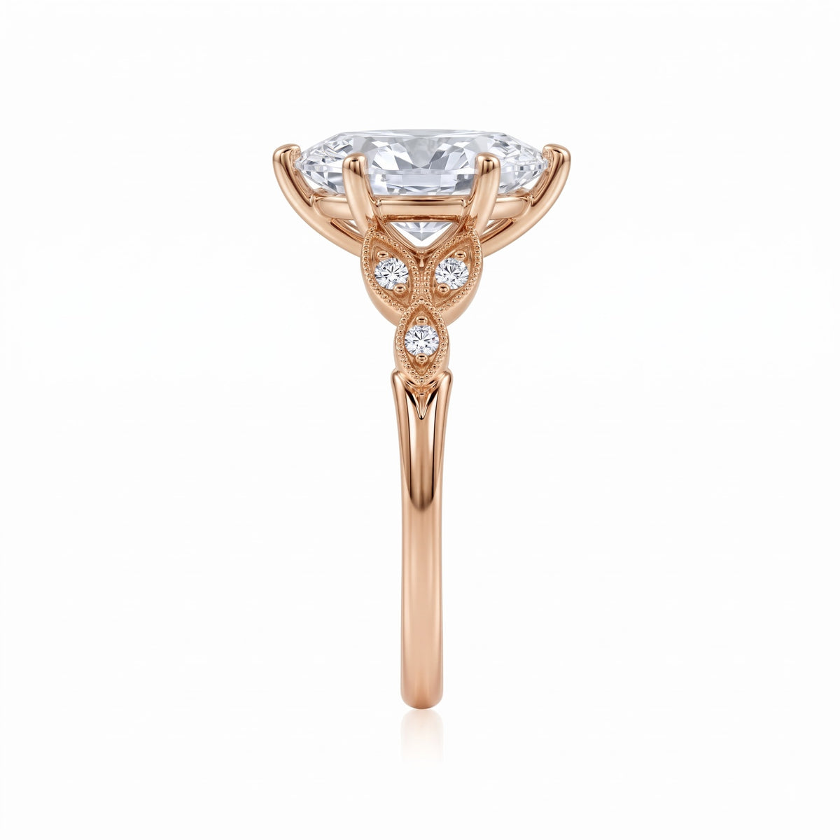 Marquise lab-grown diamond vintage leaf engagement ring with milgrain diamond accents in 14K (585) rose gold, side view