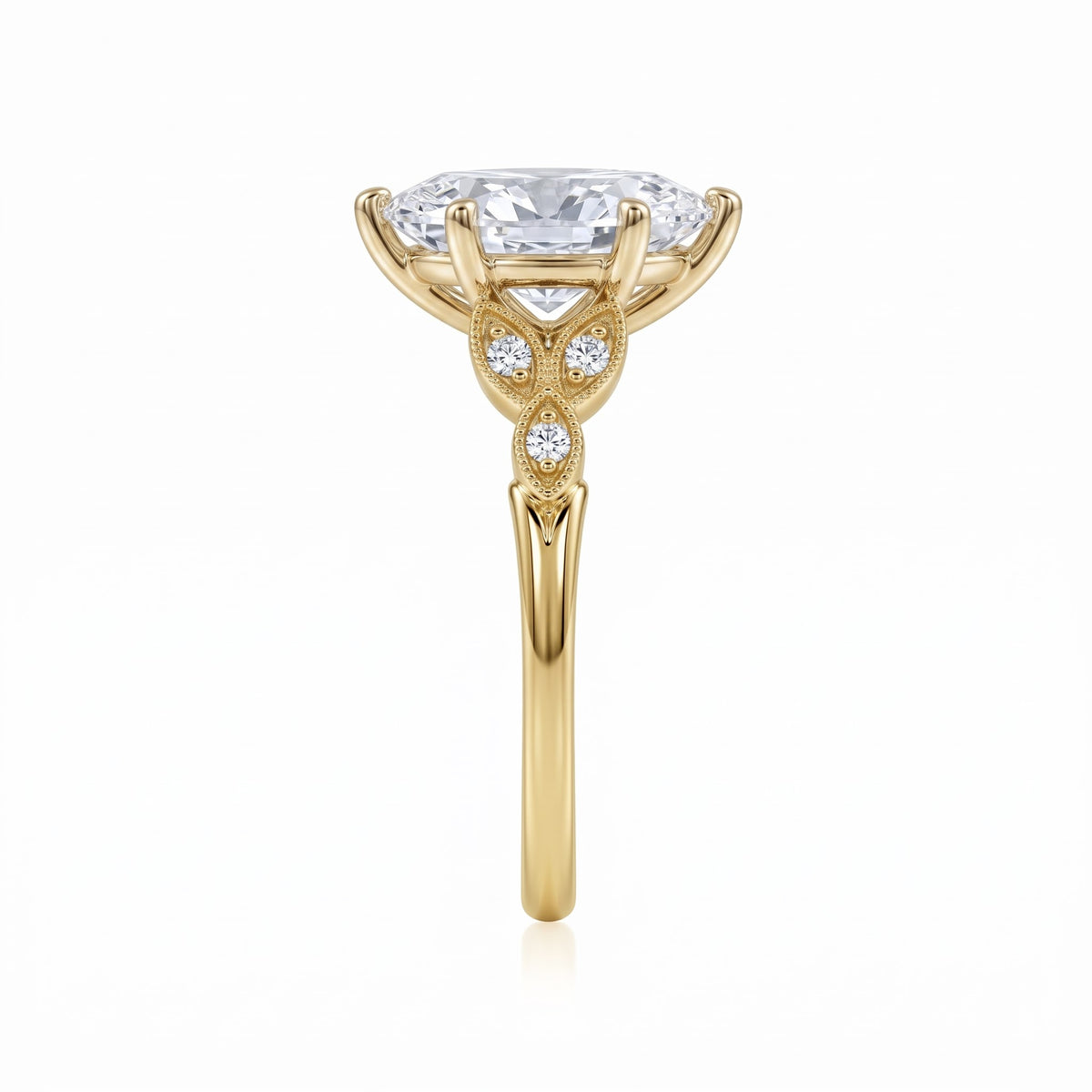 Marquise lab-grown diamond vintage leaf engagement ring with milgrain diamond accents in 18K (750) yellow gold, side view