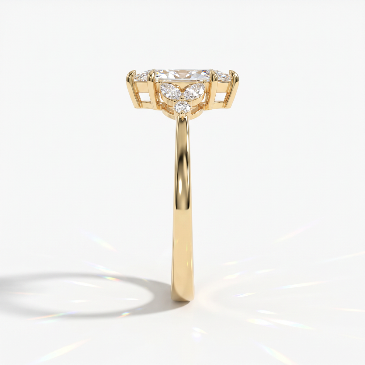 Marquise cut lab-grown diamond leaf cluster engagement ring with marquise and round accents in 14K (585) yellow gold, side view