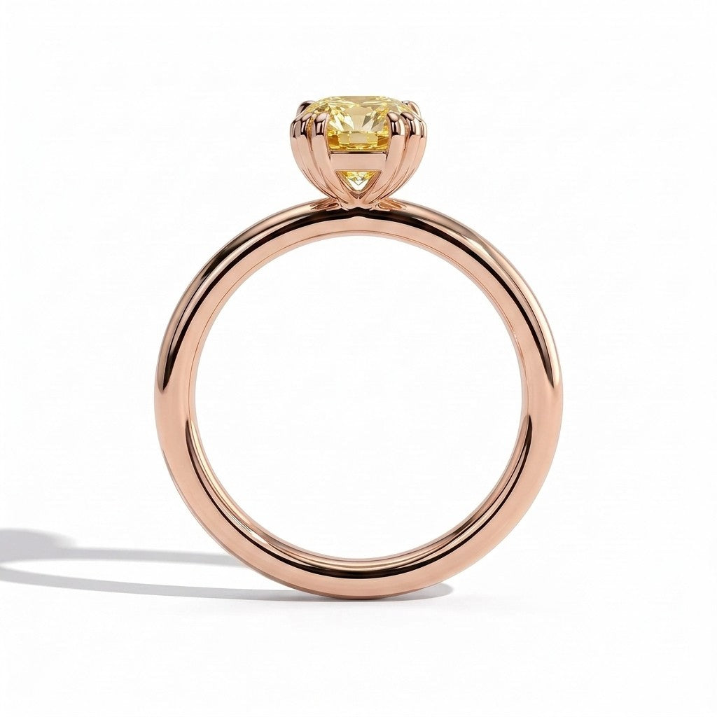 Fancy Vivid Yellow elongated cushion lab-grown diamond solitaire engagement ring with triple claw prongs in 14K (585) rose gold, side profile