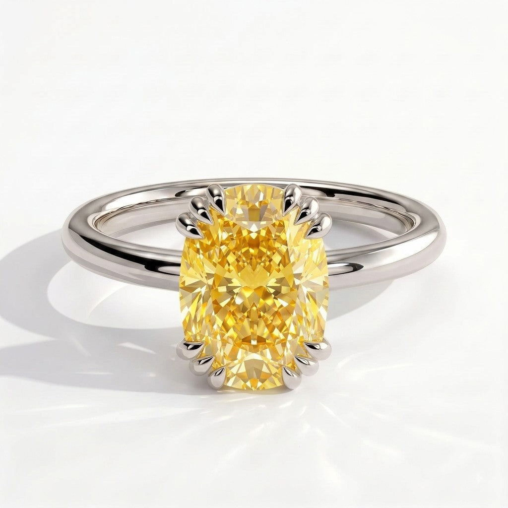 Fancy Vivid Yellow elongated cushion lab-grown diamond solitaire engagement ring with triple claw prongs in 950 platinum, front view