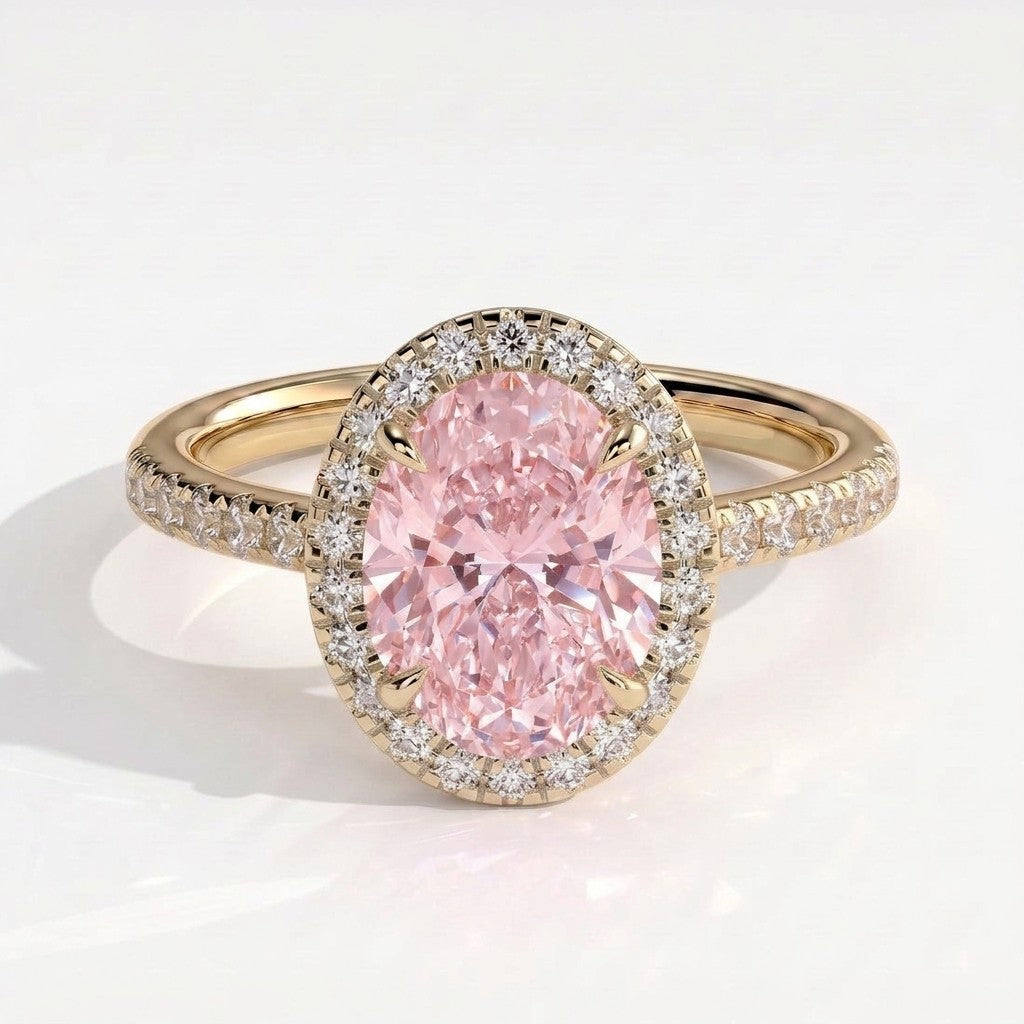 Fancy Vivid Pink oval lab-grown diamond halo engagement ring with cathedral pavé band in 14K (585) yellow gold, front view