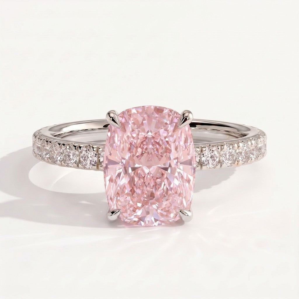 Fancy Vivid Pink elongated cushion lab-grown diamond engagement ring with hidden halo and pavé band in 14K (585) white gold, front view