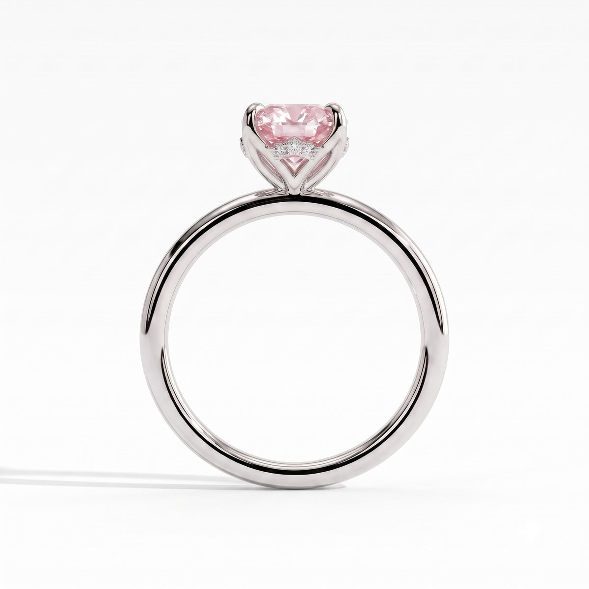 Fancy Vivid Pink oval lab-grown diamond solitaire engagement ring with petal gallery and hidden tiara in 18K (750) white gold, side profile showing the petal gallery