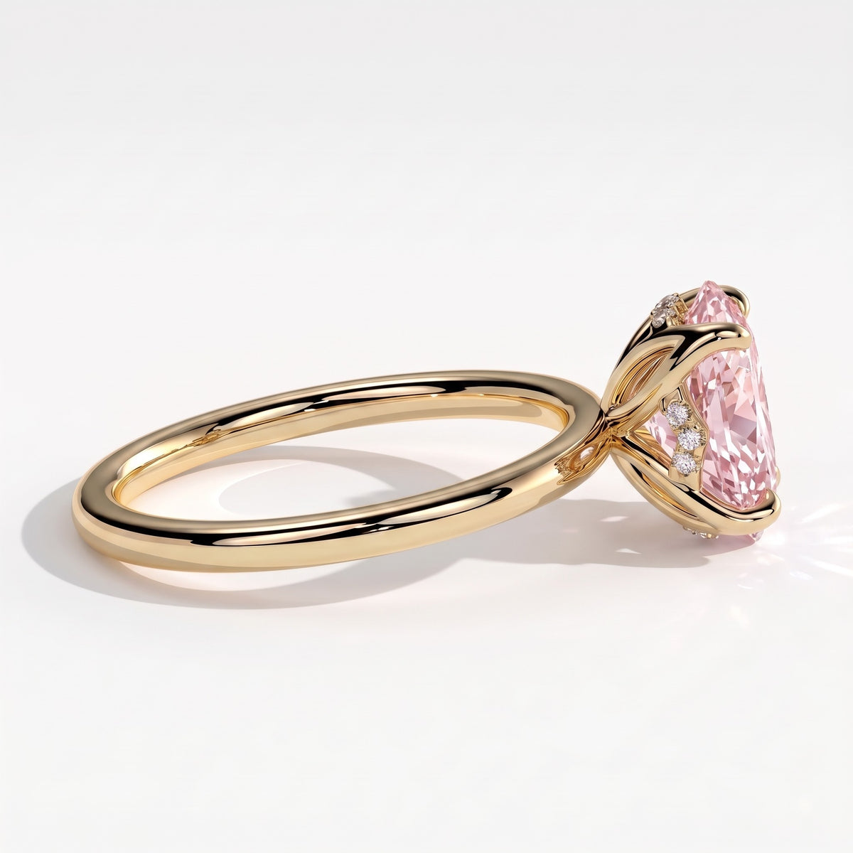 Fancy Vivid Pink oval lab-grown diamond solitaire engagement ring with petal gallery and hidden tiara in 18K (750) yellow gold, detail view of the hidden tiara
