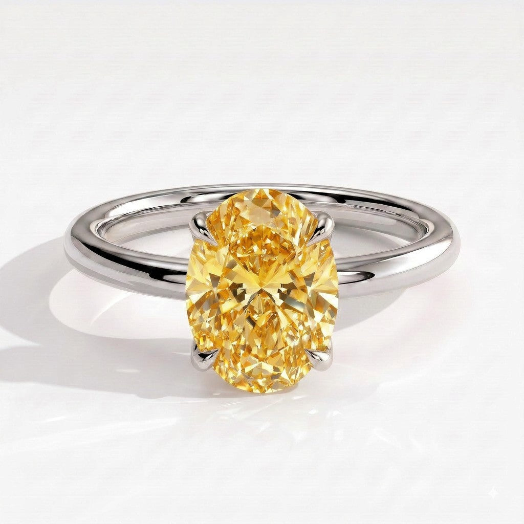Fancy Vivid Yellow oval lab-grown diamond solitaire engagement ring with petal gallery and hidden tiara in 14K (585) white gold, front view