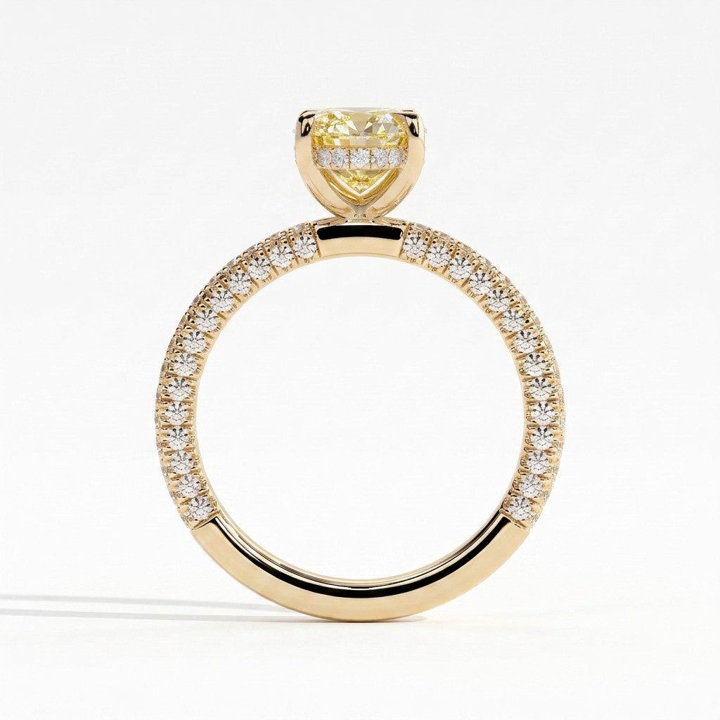 Fancy Vivid Yellow oval lab-grown diamond engagement ring with triple pavé band and hidden halo in 18K (750) yellow gold, side profile showing the hidden halo