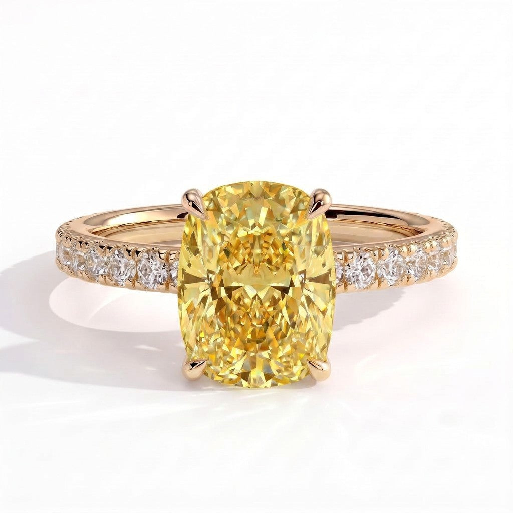 Fancy Vivid Yellow elongated cushion lab-grown diamond engagement ring with hidden halo and pavé band in 18K (750) yellow gold, front view