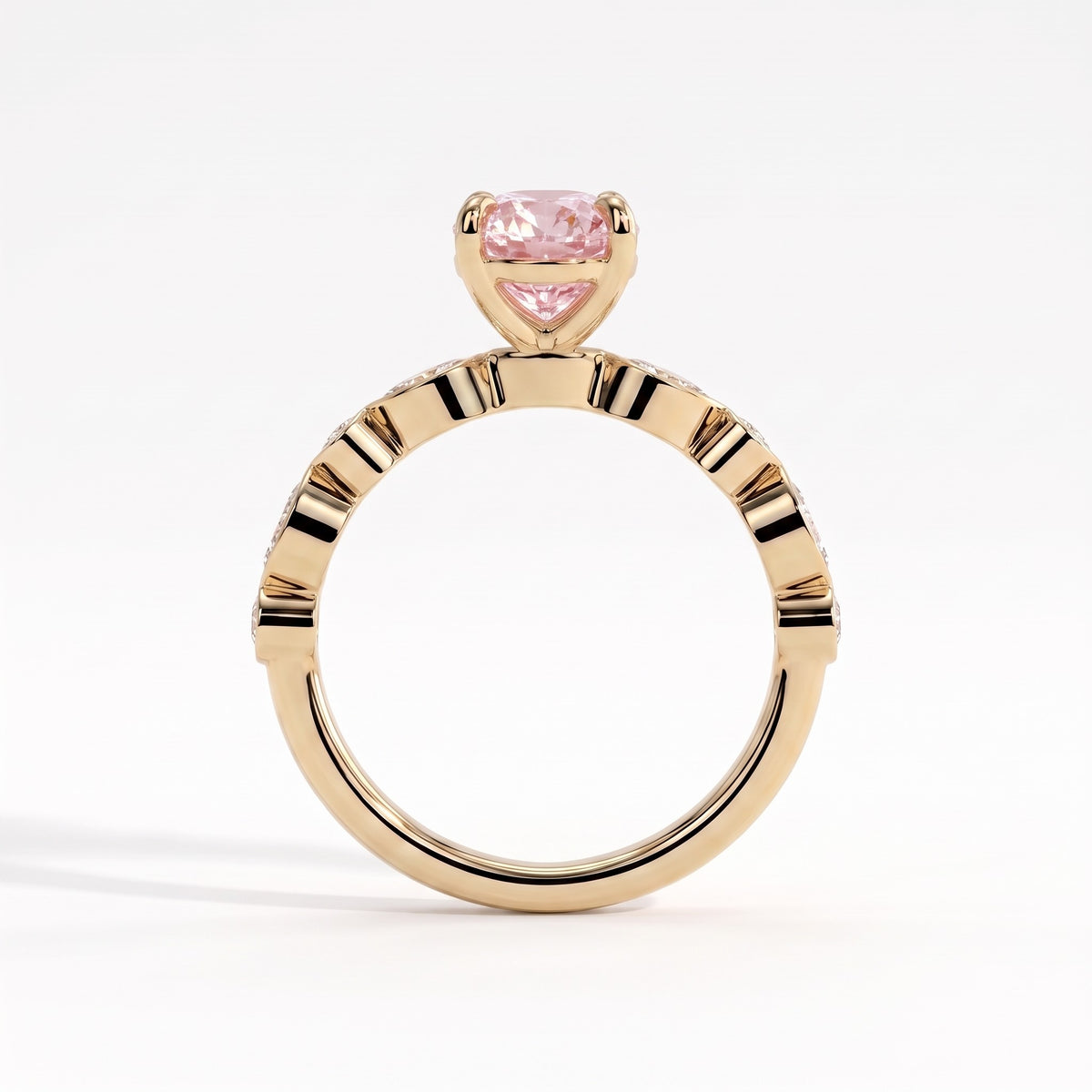 Fancy Vivid Pink oval lab-grown diamond engagement ring with bezel-set pear and round shoulder accents in 14K (585) yellow gold, side profile
