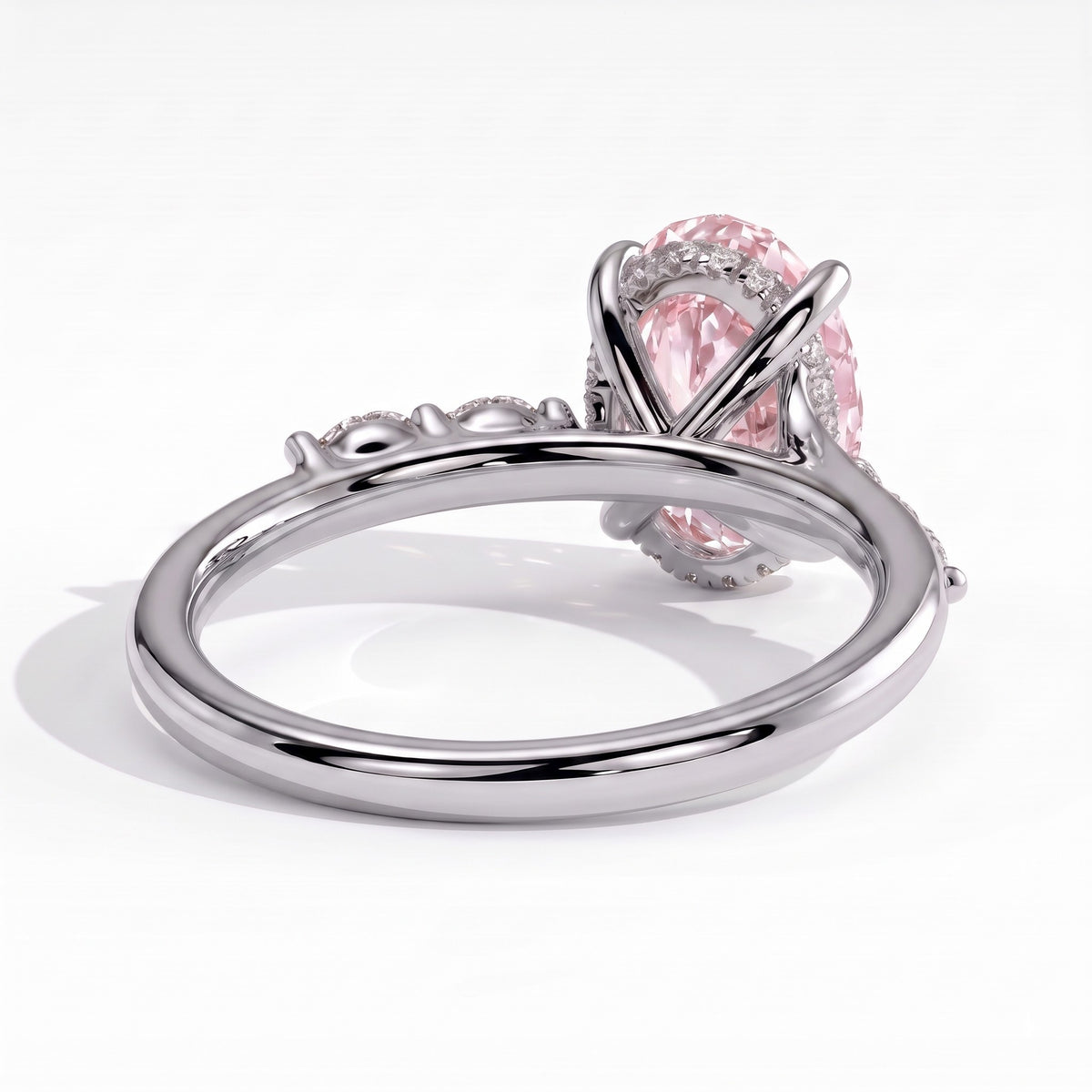 Fancy Vivid Pink oval lab-grown diamond hidden halo engagement ring with marquise accents in 950 platinum, back view showing the hidden halo