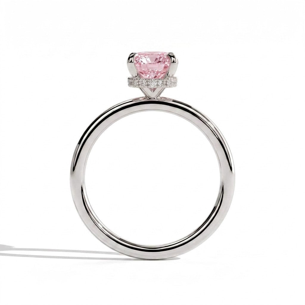 Fancy Vivid Pink elongated cushion lab-grown diamond engagement ring with wrap-around hidden halo in 950 platinum, side profile showing the hidden halo