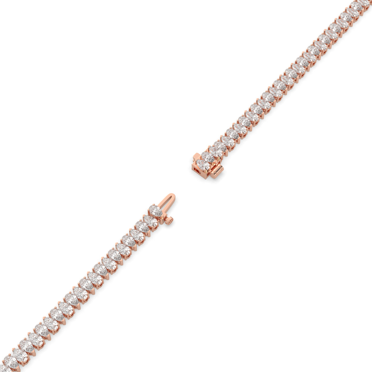 Sina upright pear lab-grown diamond tennis bracelet in 14K (585) rose gold, full length, diagonal view