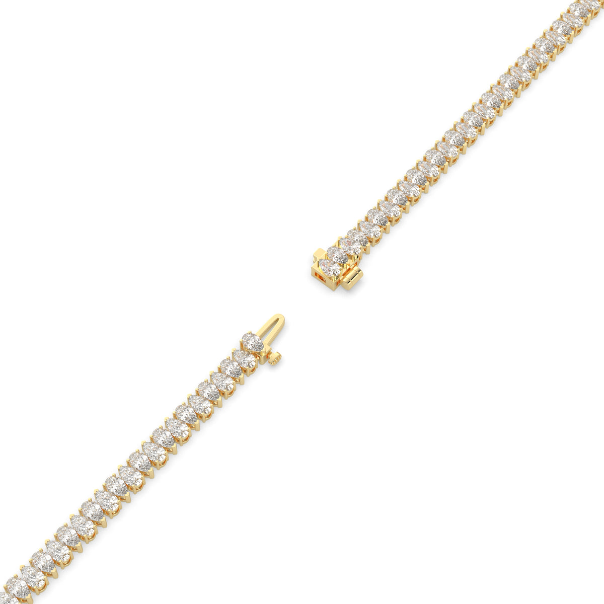 Sina upright pear lab-grown diamond tennis bracelet in 14K (585) yellow gold, full length, diagonal view
