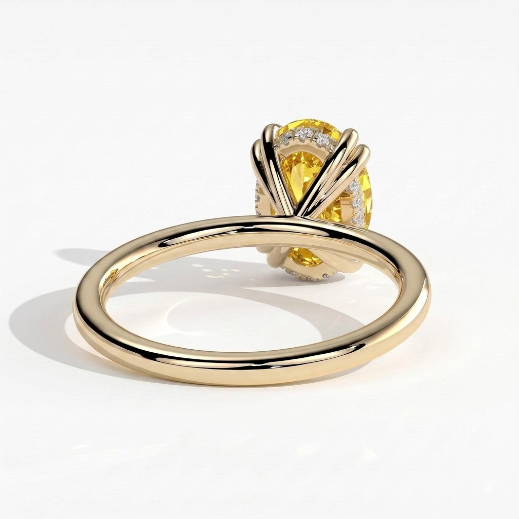 Fancy Vivid Yellow oval lab-grown diamond double claw engagement ring with hidden halo in 14K (585) yellow gold, back view