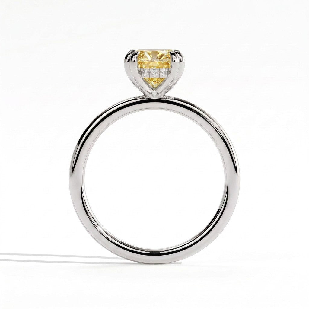 Fancy Vivid Yellow oval lab-grown diamond double claw engagement ring with hidden halo in 18K (750) white gold, side profile showing the hidden halo