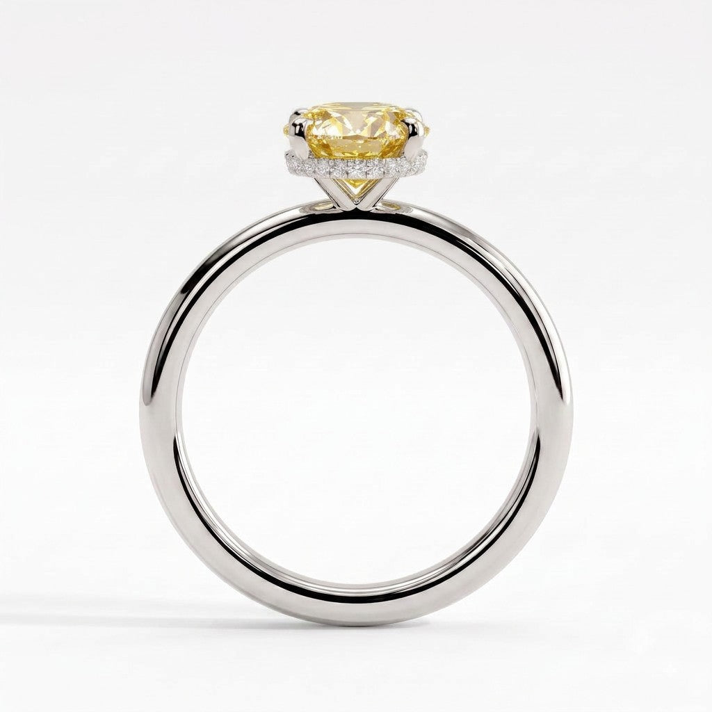 Fancy Vivid Yellow oval lab-grown diamond engagement ring with wrap-around hidden halo in 950 platinum, side profile showing the hidden halo