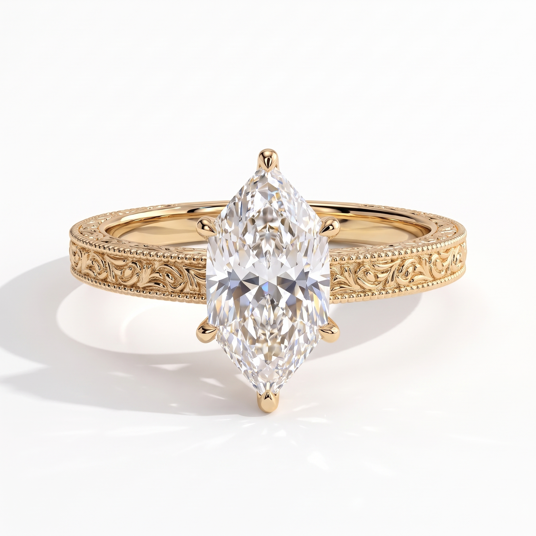 Marquise lab-grown diamond vintage engraved solitaire engagement ring in 14K (585) yellow gold, front view 