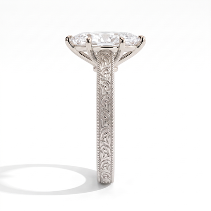 Marquise lab-grown diamond vintage engraved solitaire engagement ring in 14K (585) white gold, close-up of the hand-engraved band 
