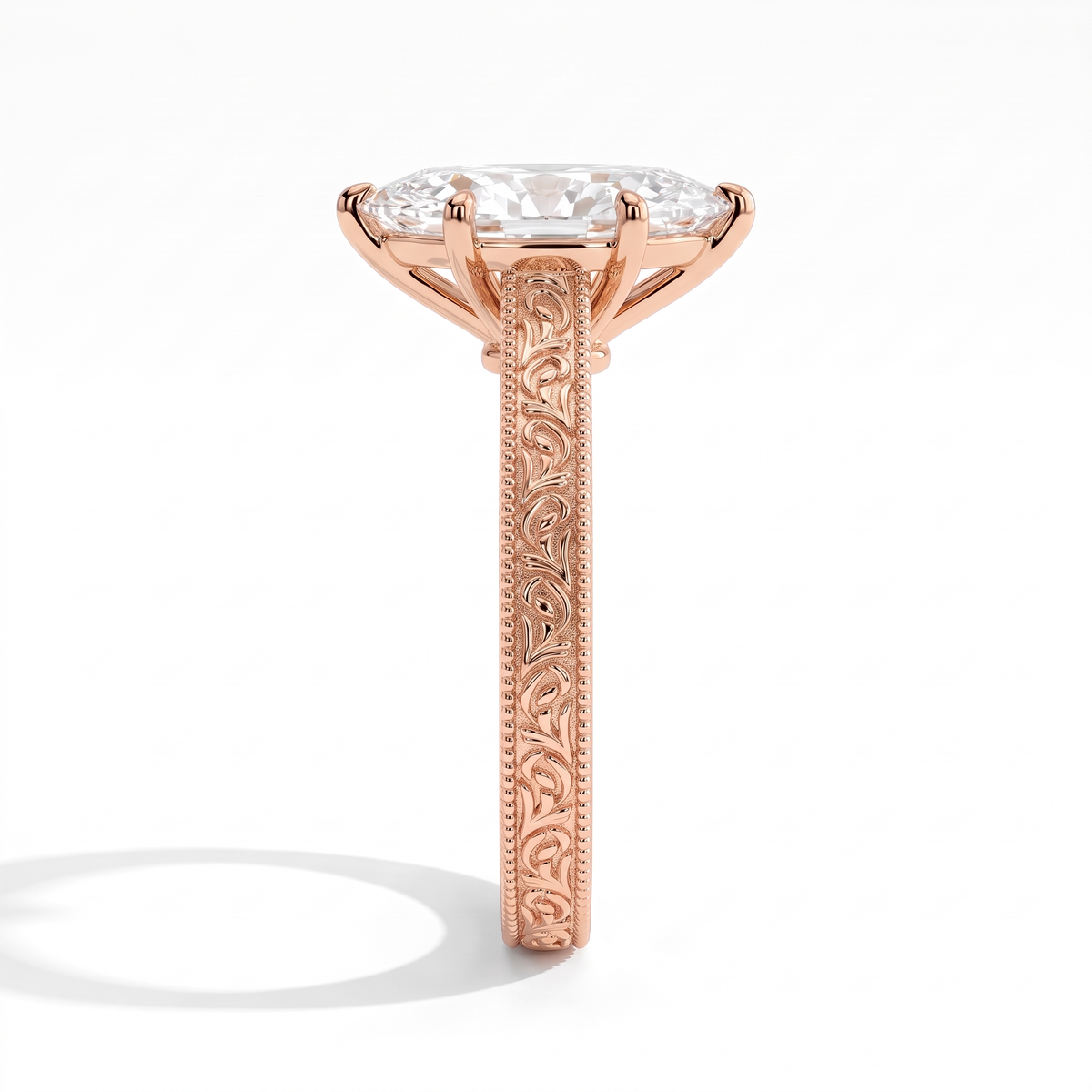 Marquise lab-grown diamond vintage engraved solitaire engagement ring in 18K (750) rose gold, profile view showing the gallery 