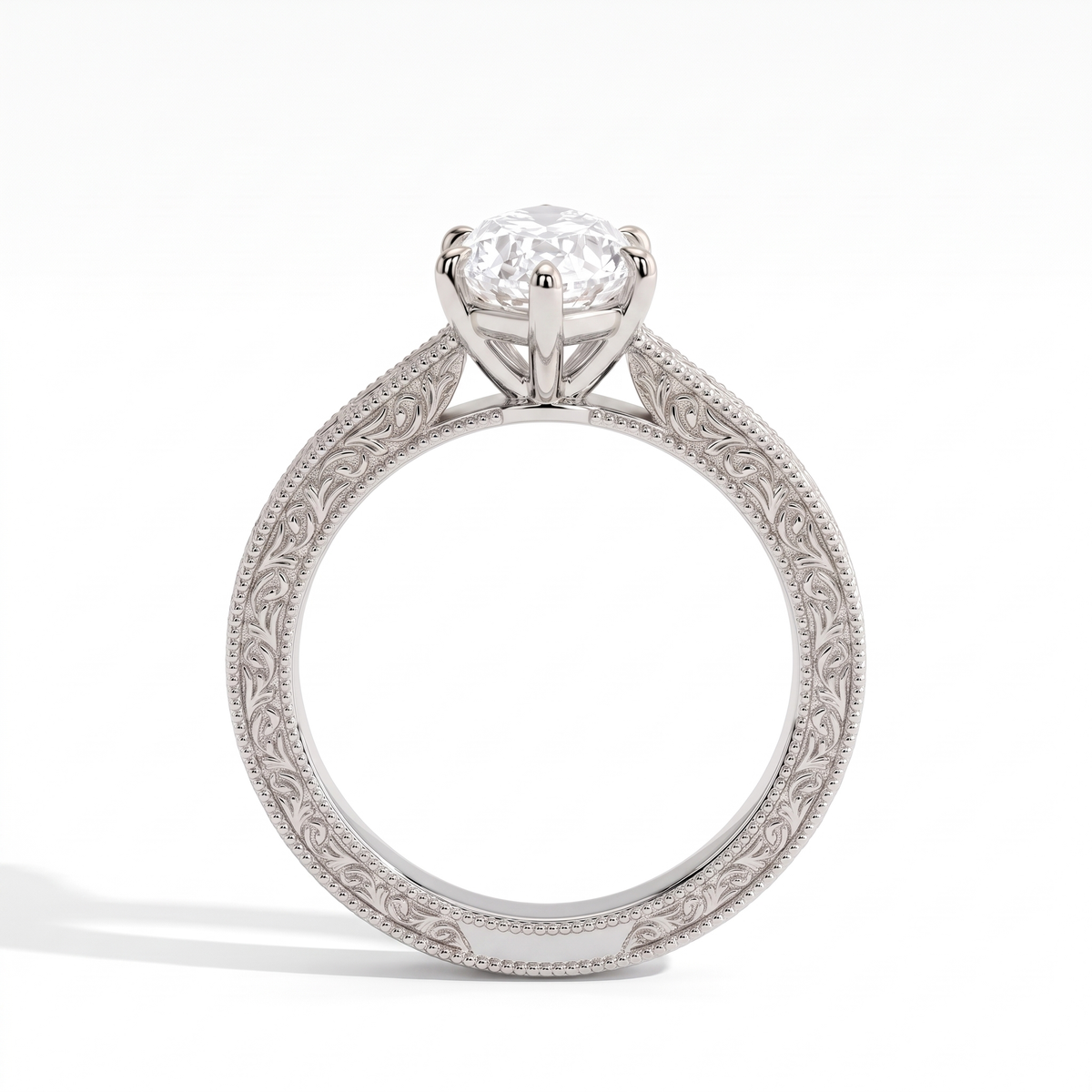 Marquise lab-grown diamond vintage engraved solitaire engagement ring in 18K (750) white gold, profile view showing the gallery 