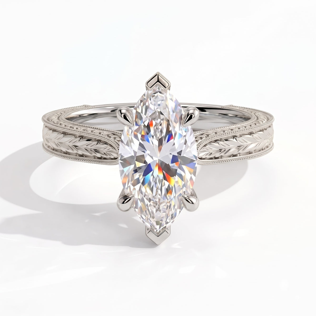 Marquise lab-grown diamond vintage solitaire engagement ring with engraved wheat band in 950 platinum, front view 