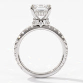 Emerald cut lab-grown diamond hidden halo collar engagement ring with pavé band in 14K (585) white gold, upright profile view 