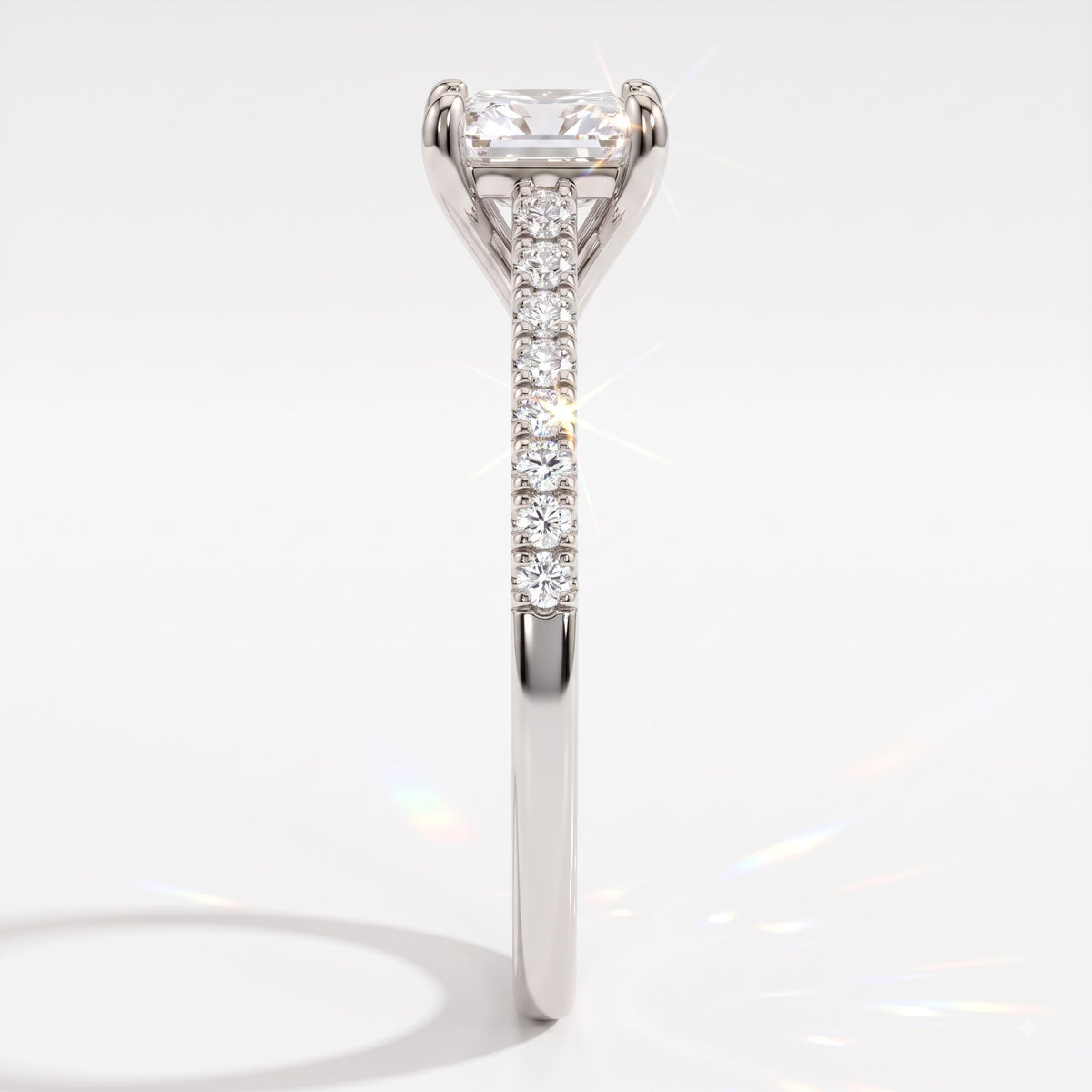 Square radiant cut lab-grown diamond engagement ring with pavé side stones in 18K (750) white gold, side view 