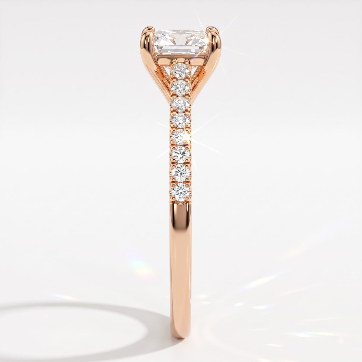 Square radiant cut lab-grown diamond engagement ring with pavé side stones in 18K (750) rose gold, side view 