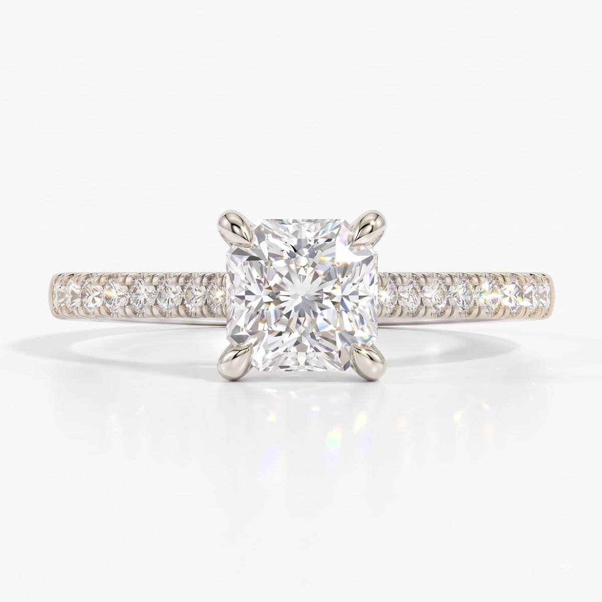 Square radiant cut lab-grown diamond engagement ring with pavé side stones in 18K (750) white gold, front view 