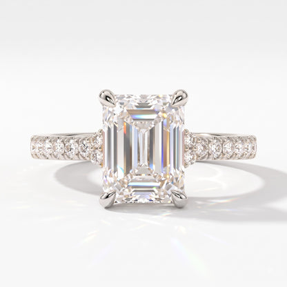 Emerald cut lab-grown diamond hidden halo collar engagement ring with pavé band in 18K (750) white gold, front view 