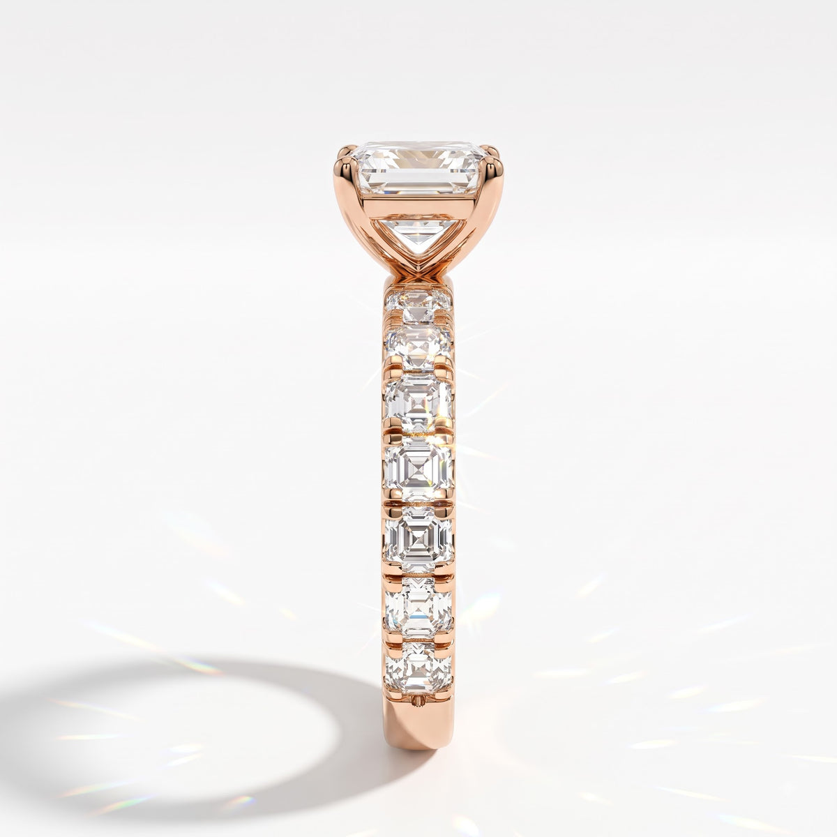 Asscher cut lab-grown diamond engagement ring with Asscher side stones in 14K (585) rose gold, side view 
