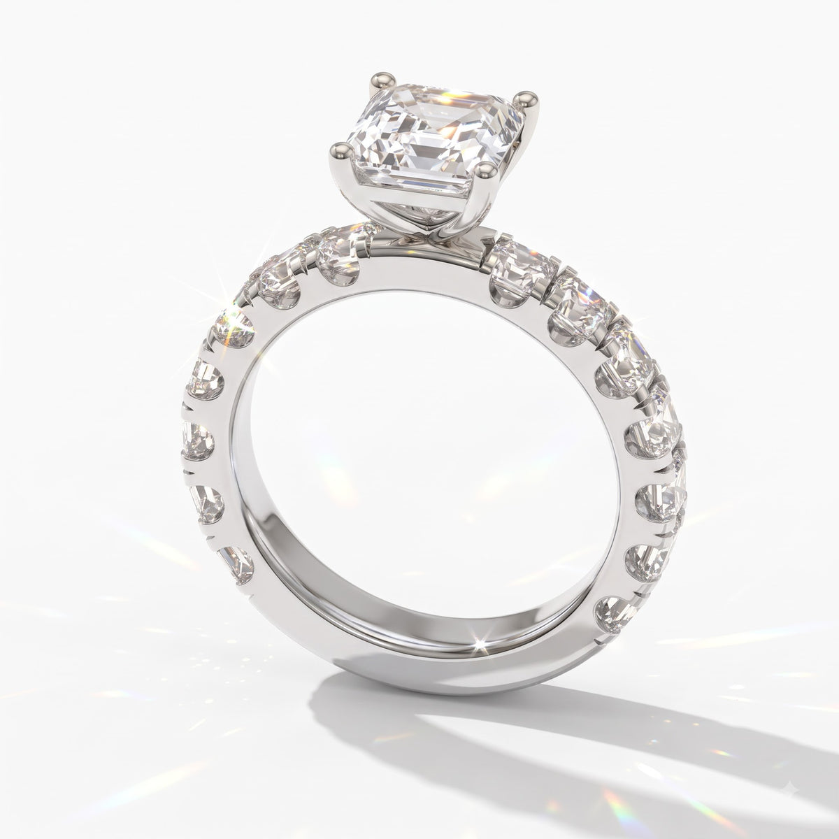 Asscher cut lab-grown diamond engagement ring with Asscher side stones in 14K (585) white gold, angled view 