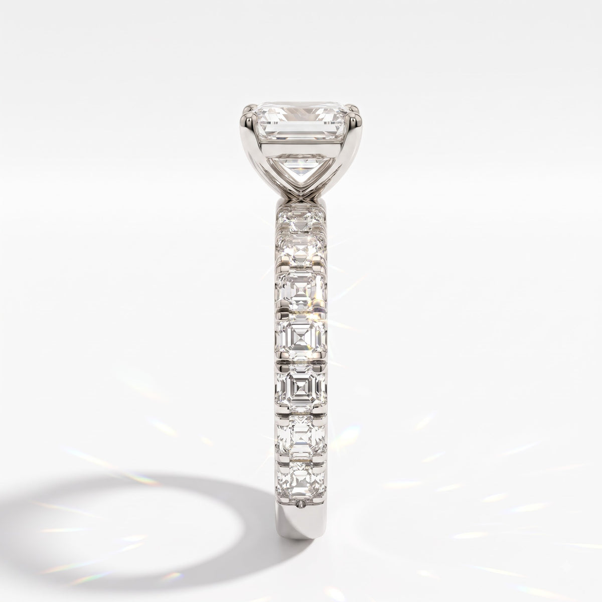 Asscher cut lab-grown diamond engagement ring with Asscher side stones in 18K (750) white gold, side view 