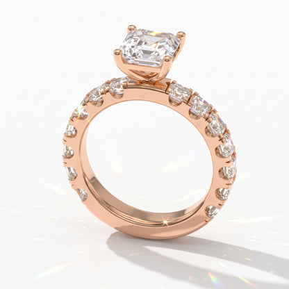 Asscher cut lab-grown diamond engagement ring with Asscher side stones in 18K (750) rose gold, angled view 