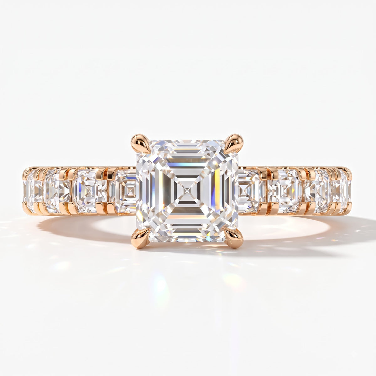 Asscher cut lab-grown diamond engagement ring with Asscher side stones in 18K (750) rose gold, front view 